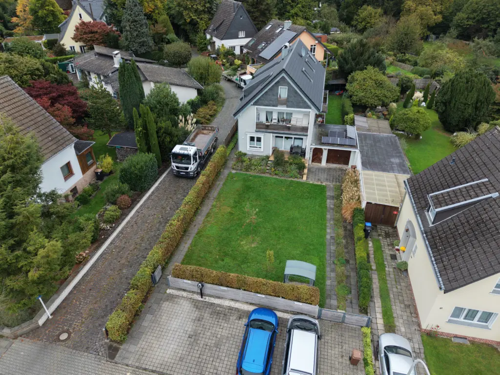 CompassPool als Überlaufpool mit Rollladenabdeckung